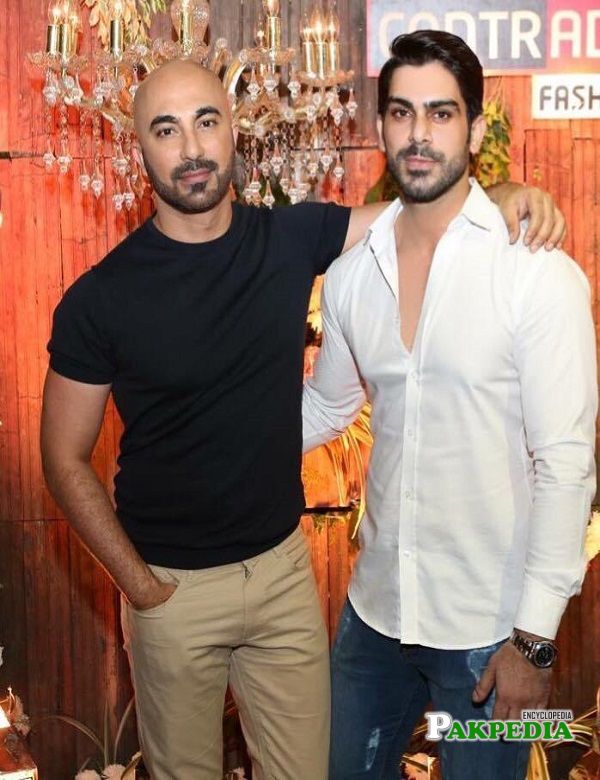 Waleed Khalid with HSY at an event