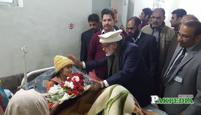 Abdul Rauf Mughal while visiting patients on behalf of Shahbaz sharif