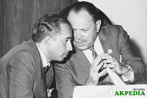 Ayub Khan Talking something 