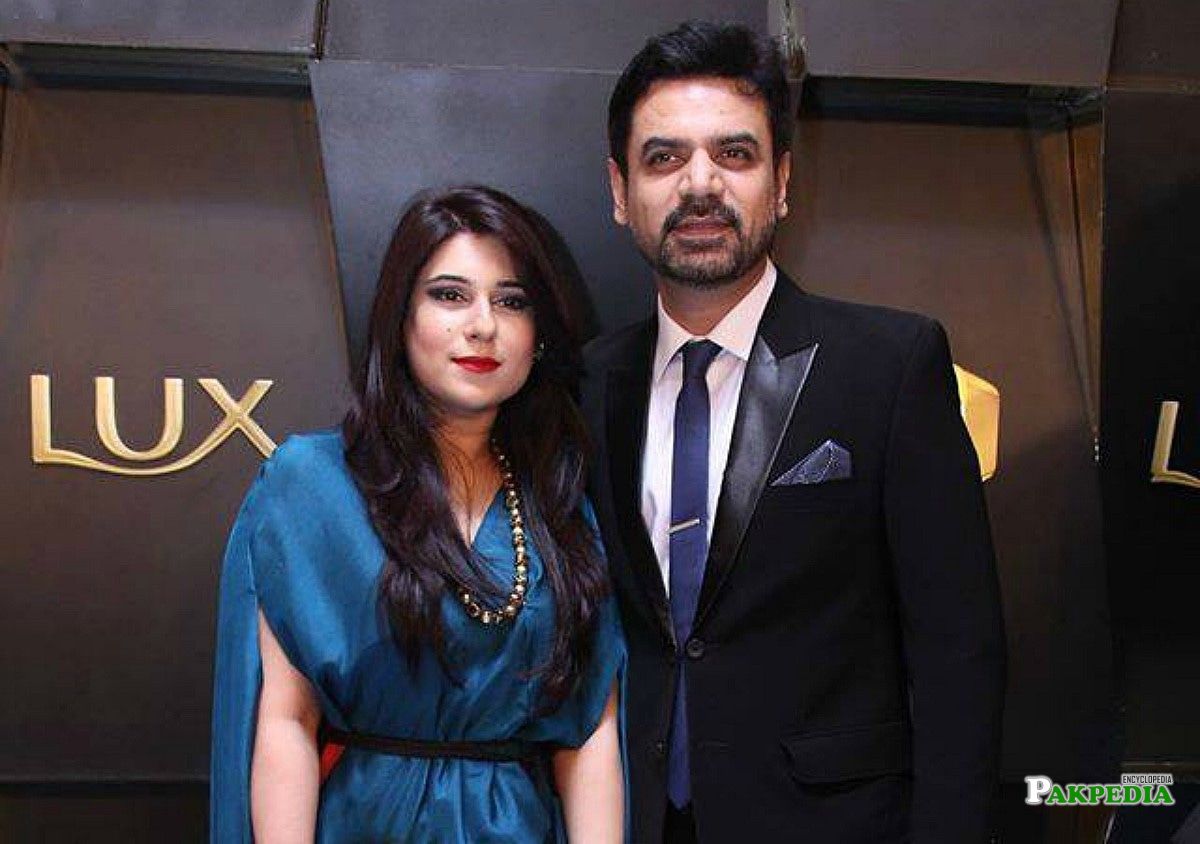 Vasay chaudhry with his wife in a Lux style award
