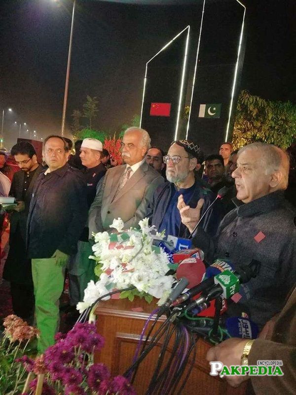 Shaikh Rohale Asghar with Shahbaz Sharif while addressing to the people