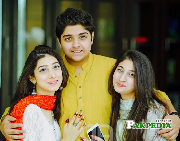 Maryam nafees with her siblings