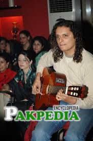 Mekaal Hasan palying guitar somewhere