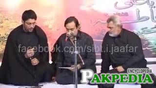 With mir hassan mir on left reciting marsiya on Hadi tv